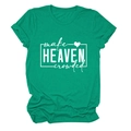 Detailed close-up of white 'make HEAVEN crowded' text print on green cotton t-shirt - Dark Green (White Font)