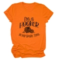 Detail of orange cotton T-shirt with black I'm a Hooker text and crochet ball design - Orange (Black Font)