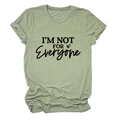 Close-up of grass green cotton T-shirt with black I'M NOT FOR EVERYONE heart graphic - Olive Green (Black Font)