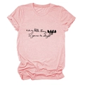 Close-up of pink round neck T-shirt with birds on wire silhouette and artistic script - Pink (Black Text)