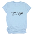 Detail view of the birds silhouette and cursive text print on a blue cotton T-shirt - Light Blue (Black Text)