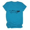 Close-up of peacock blue t-shirt featuring bird print and motivational text engraving - Lake Blue (Black Text)