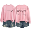 Detailed front and back views of pink graphic sweatshirt with distressed denim shorts set - S / Pink (Black Text)