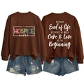 Front and back view of coffee brown hospice nurse sweatshirt with distressed denim shorts - Coffee (White Print)