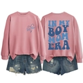 Detail view of pink long sleeve sweatshirt with In My Boy Mom Era back print and heart graphic - Rose Gold