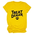Detail of a bright yellow cotton T-shirt featuring bold TREAT DEALER print and paw icon - S / Tops / Yellow