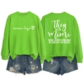 Detailed front and back view of green Mimi sweatshirt and distressed denim shorts - Fluorescent Green (White Font)