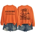 Flat lay of an orange crewneck sweatshirt with Booktrovert print and denim shorts - S / Orange (Black Letters)