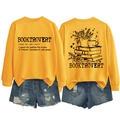 Detail of Booktrovert yellow sweatshirt and ripped denim shorts set with back graphic print - S / Yellow (Black Letters)