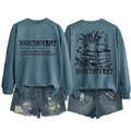 Detailed flat lay of Booktrovert navy sweatshirt with back stack of books and floral print - S / Blue (Black Print)