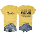 Detailed flat lay of a yellow Wrestling Mom t-shirt and distressed denim shorts - Yellow (Black Font)