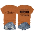 Detail of Wrestling Mom t-shirt showing front and back prints with denim shorts - Burnt Orange (Black Font)