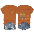 Flat lay of women's orange T-shirt with 'you matter' text and distressed denim shorts - S / Burnt Orange (White Print)