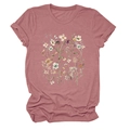 Close-up of elegant dusty rose T-shirt featuring a detailed floral botanical print design - Rose Gold