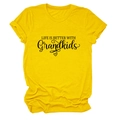 Close-up of Life is Better with Grandkids print on yellow cotton t-shirt fabric - Yellow (Black Font)