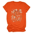 Detail of floral print on bright orange round neck T-shirt with folded cuffs and soft fabric - Orange