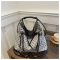 Chic grey knit tote bag with black heart patterns and decorative bow accents - Khaki Heart