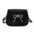 Sleek black saddle bag with a sparkling silver rhinestone bow and adjustable strap - Black
