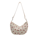 Corduroy hobo bag with strawberry print and adjustable strap on a white background - White
