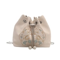 Elegant off-white bucket bag with floral embroidery and pearl chain drawstring details - White