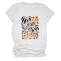 Detailed close-up of white T-shirt featuring vintage yellow floral and leaf print - White (Color Graphic)