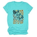 Detail of elegant mint green cotton T-shirt featuring abstract sunflower print pattern - Deep Water Blue (Graphic)
