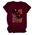 Close-up of vintage floral print and round neckline on burgundy cotton short-sleeve T-shirt - Wine Red (Color Graphic)