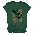 Close-up of floral print and fabric texture on a dark green short sleeve T-shirt - Retro Green (Graphic)