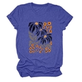 Close-up of hand-painted floral print on navy blue rolled sleeve crewneck t-shirt - Retro Blue (Graphic)