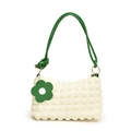 Cream-colored bubble texture shoulder bag with green knotted straps and flower charm - White & Green