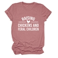 Close-up of pink crewneck T-shirt featuring Raising Chickens and Feral Children print - S / Rose Gold (White Font)