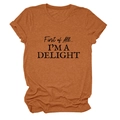 Detail of burnt orange crewneck T-shirt showing First of All I'M A DELIGHT text and rolled cuffs - Burnt Orange (Black Font)