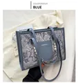 Blue tote bag with pearl chain, pleated fabric texture and dual slender handles - Blue