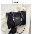 Chic black underarm bag with floral texture and elegant white pearl chain strap - Black