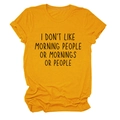 Detail of loose fit ginger yellow crew neck tee with black text print on cotton fabric - Mustard Yellow (Black Text)