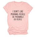 Detail of pink cotton T-shirt showing folded sleeves and black letter printed text - Pink (Black Print)