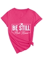 Detail of V-neck fuchsia t-shirt with Be Still And Know print and stylish side knot design - Rose Red (White Font)
