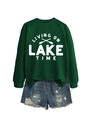 Detail view of cotton sweatshirt with Living On Lake Time print and frayed denim shorts - Dark Green Sweatshirt (White Font)