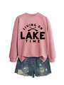 Detail of pink cotton sweatshirt with 'LIVING ON LAKE TIME' print and ripped denim shorts - Rose Gold Sweatshirt (Black Font)