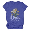 Detailed view of the All Oopsies No Daisies floral print on a heather blue cotton T-shirt - Retro Blue (White Text)