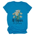 Detail of the sky blue cotton T-shirt with daisy illustration and slogan print - Lake Blue (Black Text)