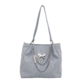 Light blue large capacity tote bag with silver butterfly charm and pearl chain details - Blue