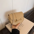 Beige saddle bag with pebble leather texture and silver ball chain strap detail - Khaki