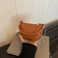 Mini orange-brown pebble leather saddle bag with star rivets and silver chain strap - Brown