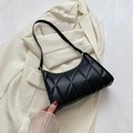 Classic black quilted shoulder bag with soft padded texture and minimalist gold zipper - Black