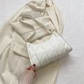 Elegant white quilted crossbody bag with diamond stitch pattern and gold buckle detail - White