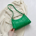 Vibrant green quilted shoulder bag with gold hardware on a minimalist background - Green