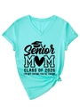 Detail of V-neck cotton T-shirt featuring Senior Mom Class of 2026 print in cyan - S / Deep Water Blue (Black Font)