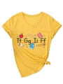 Dettaglio maglietta gialla con scollo a V, motivi scolastici e stampa Tt Gg Ii Ff - S / Giallo