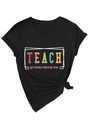 Detail of V-neck black T-shirt featuring colorful Teach Them To Be Kind slogan print - Black (White Graphic)